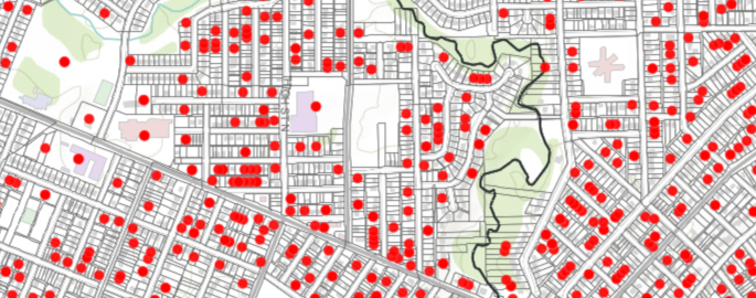 Section of a map from the Building Permit Dashboard showing red dots representing building permits on an urban map of Thunder Bay.