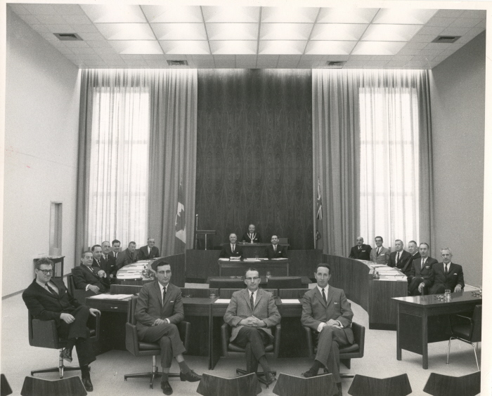 City Council and Executive, 1966 A group of people sitting around a squared off table in an official council chamber