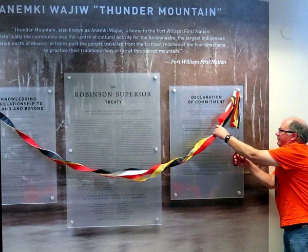 Retired City Archivist Matt Szybalski cuts ribbon on new Indigenous Recognition Wall at City Archives